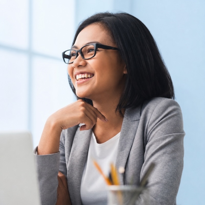 Professional reflecting on personal career and wellbeing goals